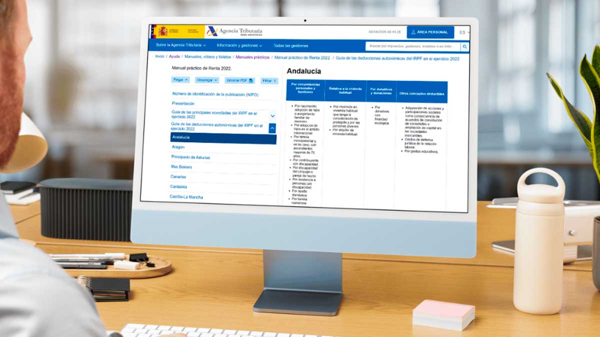 Pantalla de ordenador con la web de la Agencia Tributaria mostrando las deducciones de la Renta en Andalucía